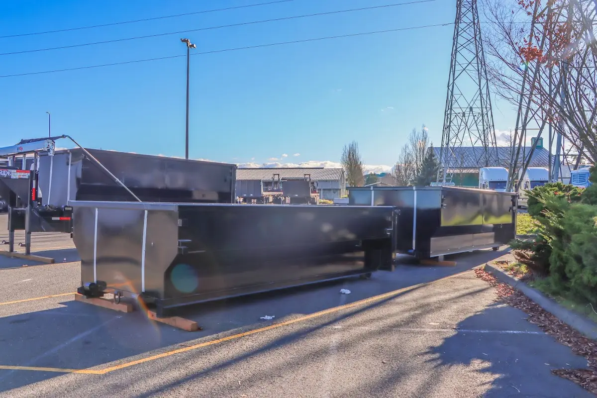 Roll-off dumpster ready for waste disposal at job site for 2 Yard Dumpster Rental in Ripley
